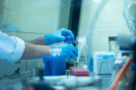 Female researcher carrying out research experiment in a chemistry labの写真素材