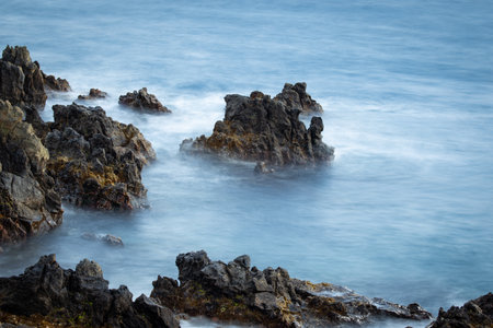 Crashing waves on rocks landscape nature view and Beautiful tropical sea with Sea coast view in summer seasonの写真素材