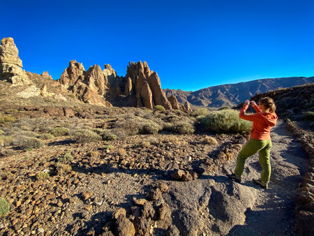 Colorful scenic landscape of moon rise in Tenerife national park of Teide. El Teide with moon rising by its side.の写真素材