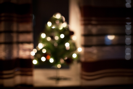 Christmas tree and lights with Christmas toys in the Blurred abstract dark background!の写真素材