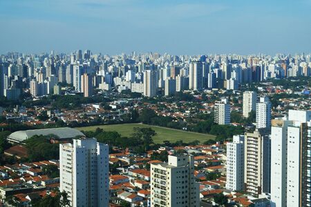 Bird's-eye view of a metropolis with skyscrapers all the way to the horizon..の写真素材