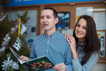 2016.01.17 Business school training in the Samara University. Girl and boy are reading and studing concept of studing, reading, news and information .のeditorial素材