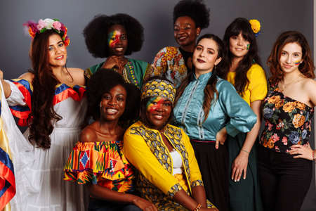 Happy multi ethnic, multicultural young students have a party looking at camera, smiling, posing together at meeting, tolerance and racial equality conceptの写真素材
