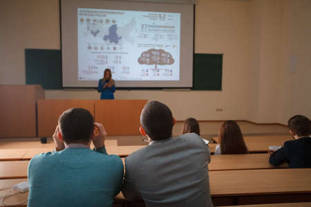 2016.01.17 Business school training in the Samara University. Multiethnic Students studying and having a discussion with the teacherのeditorial素材