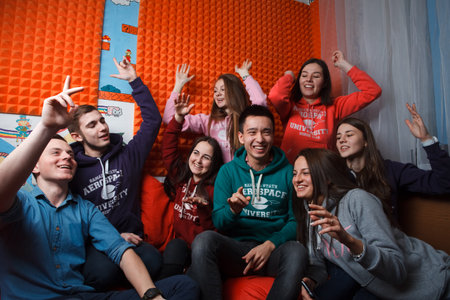 2016.01.17 Business school training in the Samara University. Young happy cheerful students making sitting together in a campus laughing, singing, joking, smiling.のeditorial素材