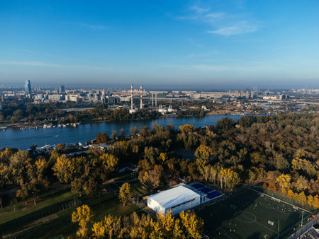 Drone view above the open public park and green trees. Europe. 4K.の写真素材
