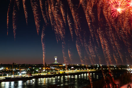 27th of June 2024. International Fireworks festival near the amusement park. Montreal. Holiday fireworks above waterの写真素材