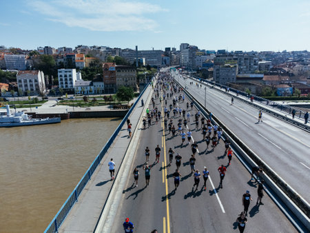 28rd of April 2024, aerial view of people running a marathon on highway. Belgrade, Serbia, Europe.