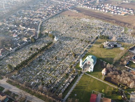 Drone view of the Catholic church and cemetery on the sunrise. Sombor, Serbia, Europeの写真素材