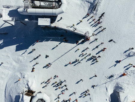 Winter sports: top view of people skiing in a ski resort in Kopaonic, Serbia.の写真素材