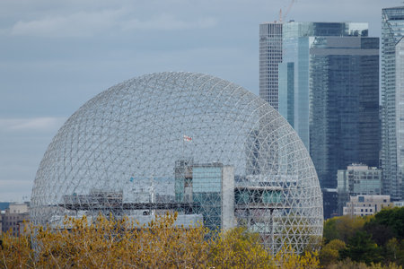 Drone view of Montreal Biosphere at the Park Jean-Drapeau, with the downtown of Montreal in the background. Quebec, Canadaの写真素材
