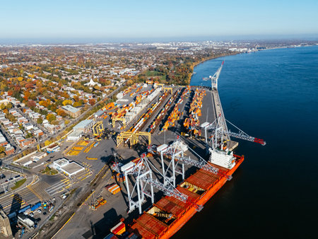 Ship is in the dock, container port. Montreal, Quebec, Canada.の写真素材