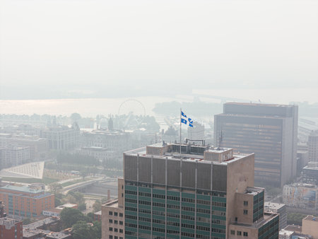 Heavy smog in Montreal downtown because of wildfire and industrial pollution, Quebec, Canadaの写真素材