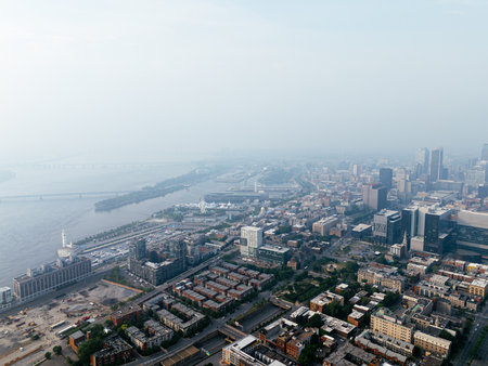 Heavy smog in Montreal downtown because of wildfire and industrial pollution, Quebec, Canadaの写真素材