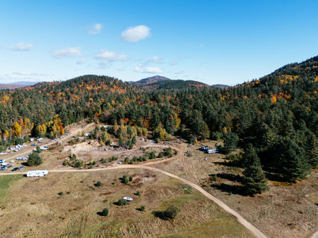 Fall Colours in the White Face Mountain ski resort and lake. Color Change, Vermont, USA.の写真素材