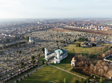 Drone view of the Catholic church and cemetery on the sunrise. Sombor, Serbia, Europeの写真素材