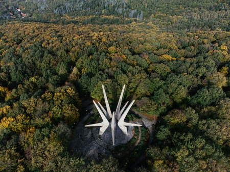 Kosmaj mountain memorial monument atop wooded hill under blue sky, aerial view serbia. g.の写真素材