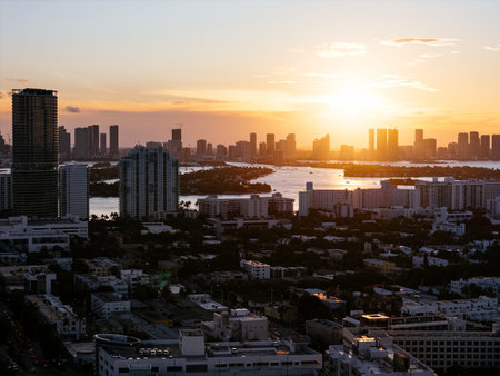 Aerial view of Biscayne Bay and Miami skyline at sunset with small islands and boats in the water. g.の写真素材