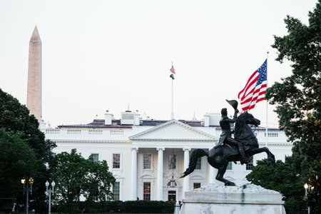 White House with Andrew Jackson statue and US flag, Washington DC landmark at dusk. c.の写真素材