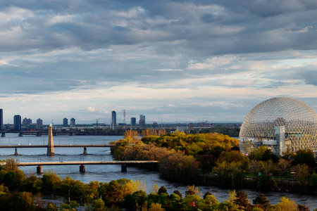 Drone view of Montreal Biosphere at the Park Jean-Drapeau, with the downtown of Montreal in the background. Quebec, Canadaの写真素材