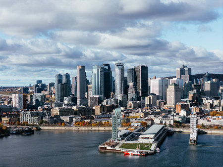 Aerial view of Montreal Old Port, downtown, historic buildings and waterfront under blue sky. g.の写真素材