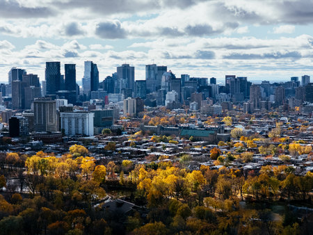 Aerial view of downtown Montreal and autumn trees in park under cloudy sky. g.の写真素材