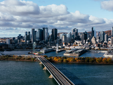 Aerial view of Montreal Old Port, downtown, historic buildings and waterfront under blue sky. g.の写真素材