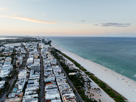 Aerial view of Miami South Beach skyline, buildings, coastline and ocean at sunset light, Florida, USA*の写真素材