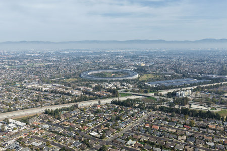 February 1, 2026 - Cupertino, California, USA - Aerial drone view of Apple Park headquarters campus in Silicon Valley. g.のeditorial素材