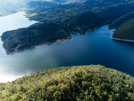 Aerial view of Rovni Lake reservoir and surrounding hilly landscape in Serbia. g.の写真素材