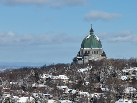 Saint Josephs Oratory dome above snowy Westmount and Montreal neighborhood on Mount Royal hill in winter, Quebec, Canada. g.の写真素材