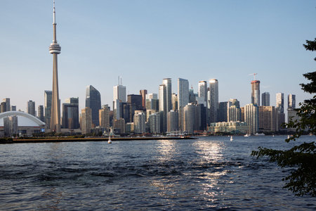 Toronto skyline with CN Tower and waterfront on Lake Ontario at sunset, Ontario, Canada. g.