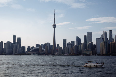 Toronto skyline with CN Tower and waterfront on Lake Ontario at sunset, Ontario, Canada. g.