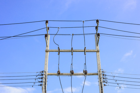 Power lines on blue sky