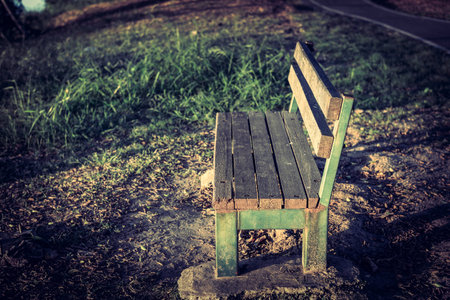 Old wood bench in parkの写真素材