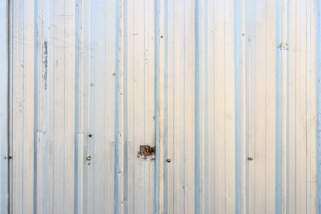 Rusty old corrugated iron fenceの写真素材