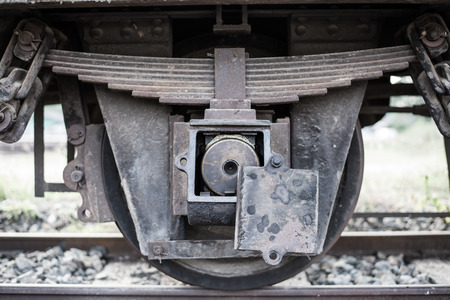 Old train wheel on a trackの写真素材