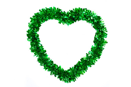 Ribbon green in shape heart isolate on white backgroundの写真素材