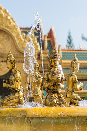 Thai statue angle fountain in temple of Thailandの写真素材