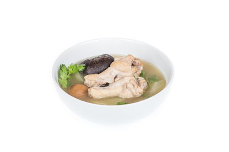 Chicken soup in white cup isolate on white backgroundの写真素材