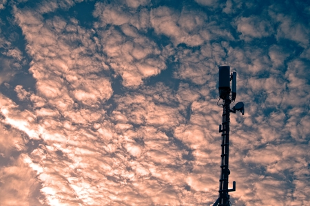Cellphone base station against dramatic sky.の写真素材