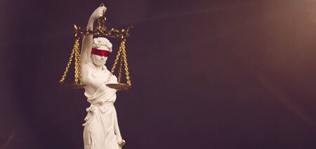 Portrait of lady Justice with red blindfold. Panoramic image with copy space.の写真素材