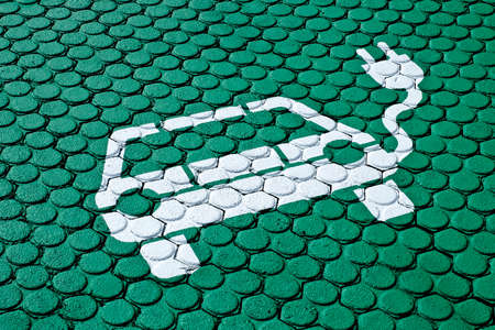Sign at an electric vehicle parking space.の写真素材