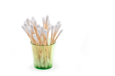 Bamboo cotton swabs, plastic free body care items isolated on white background.の写真素材