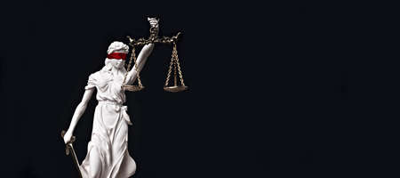 Justitia, the Roman goddess of Justice with red blindfold. Panoramic image with copy space.の写真素材