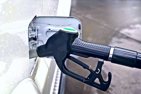 Refilling a car with fuel at the gas station.の写真素材