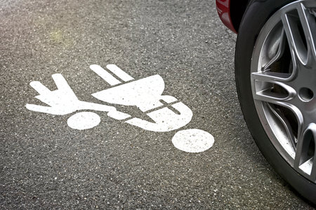 Close-up of car parked on the sidewalk. Horizontal image with selective focus.の写真素材