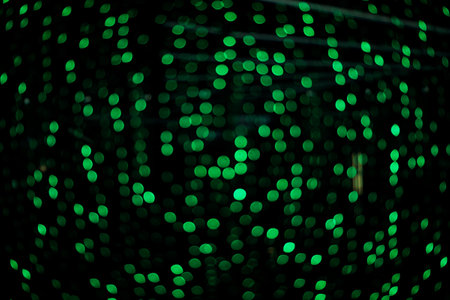Abstract green bokeh background. Decoration and holiday illumination concept.の写真素材