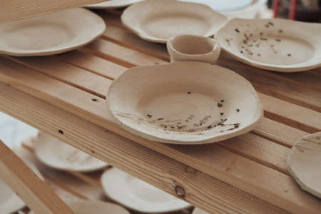 Handmade Crafted Clay Plate and Pot in the Ceramic Studio