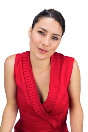 Smart tied haired brunette posing on white background の写真素材